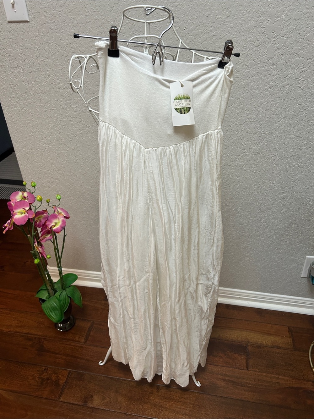 White silky wide leg pull on pants
by Cane Field Clothing